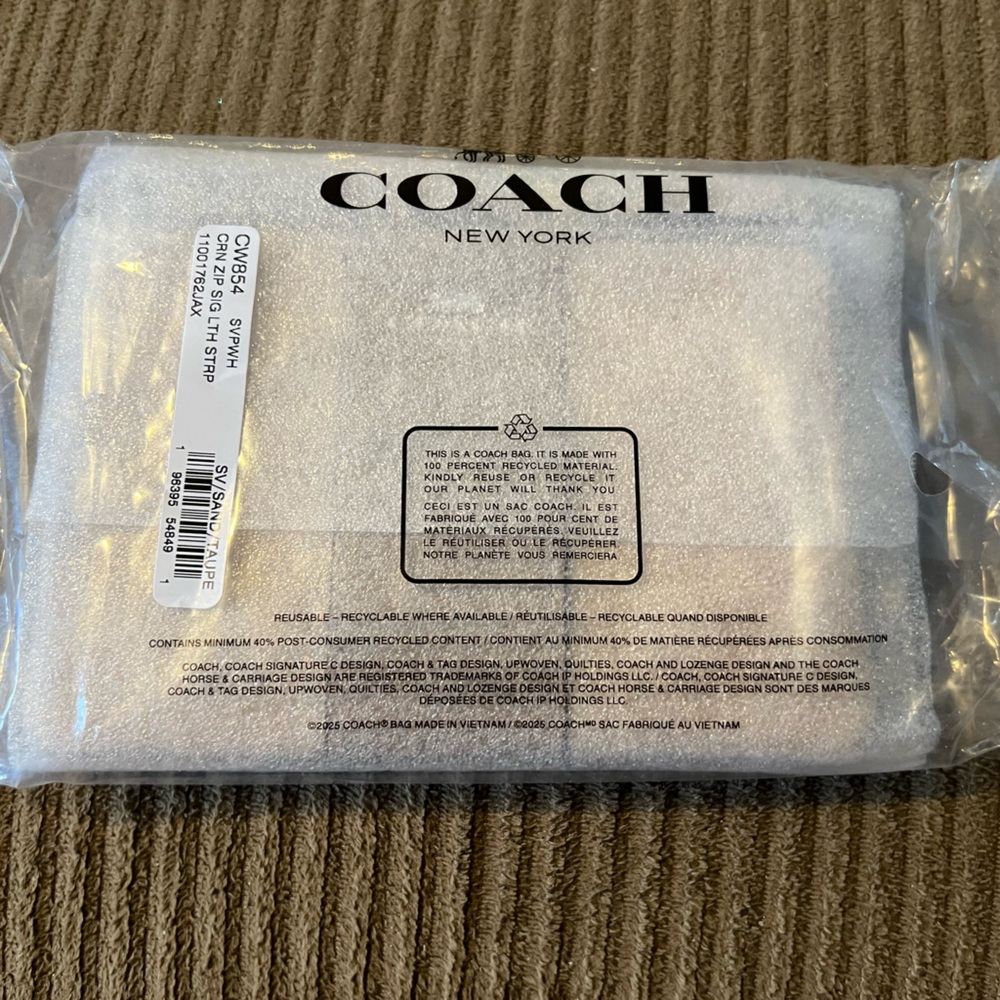 Coach Corner Zip Wristlet
In Signature Canvas With Stripe nwt - Picture 2 of 3